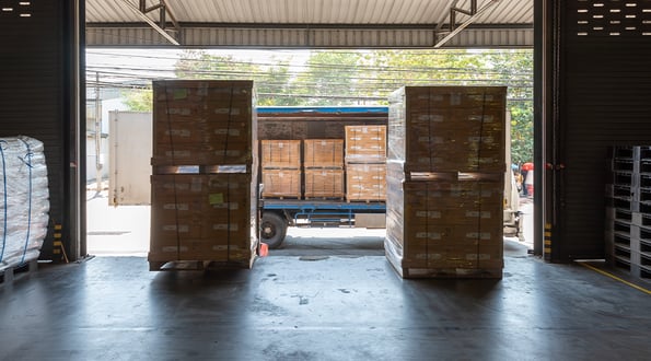 Pallets at a warehouse dock ready for loading