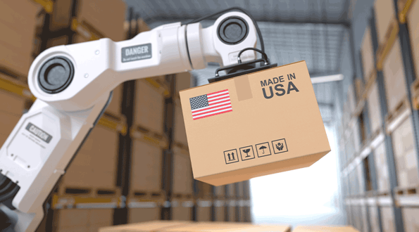 A robotic arm holding a packing box