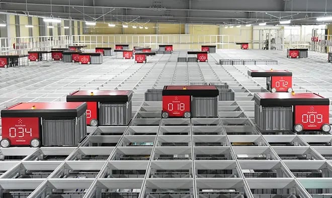 Robots moving across the AutoStore Grid at the Osakai Medical warehouse in Japan