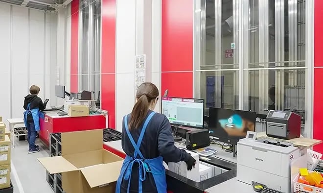 Workers packing orders in the Osakai Medical Central Japan warehouse