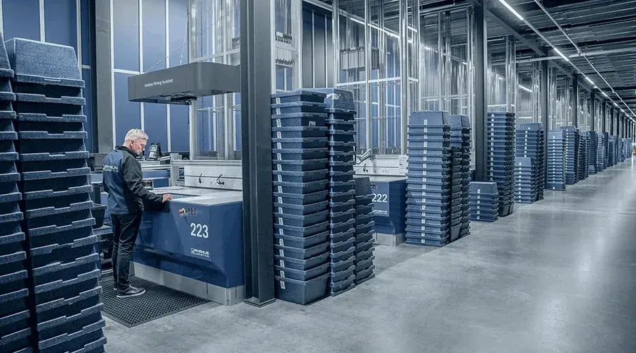 caption: At Rhenus, system uptime has reached 99.8%, and operator training time has fallen by 75% while productivity has doubled, demonstrating how fine-tuned operations can create dependability and consistency in a high-throughput environment.