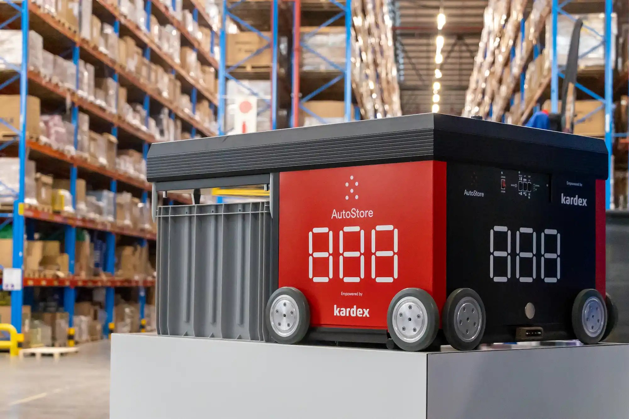 An AutoStore Robot displayed with Kardex partner branding 