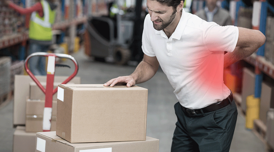 Warehouse worker with back pain pushing a forklift. Image.