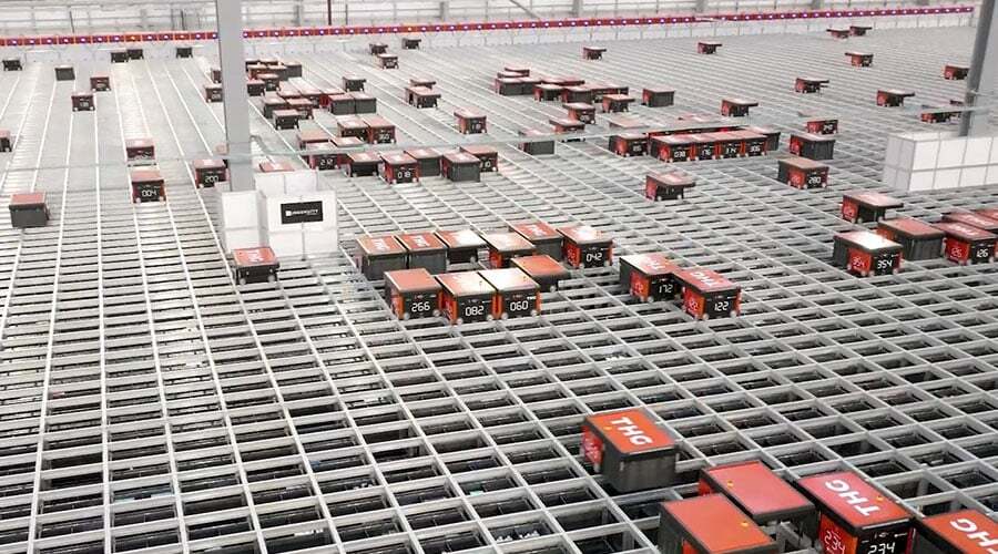 AutoStore R5 Robots at THG warehouse. Image.